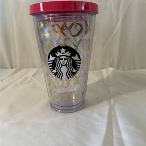Starbucks Clear Tumbler with Pink Lid and Gold XO Pattern. No straw.